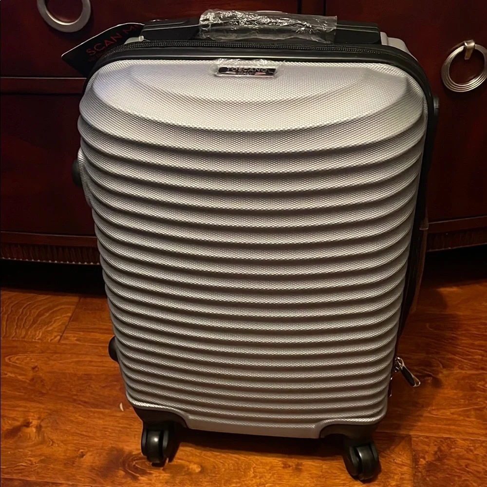 Silver and Black Cylindrical Storage Container with Wheels